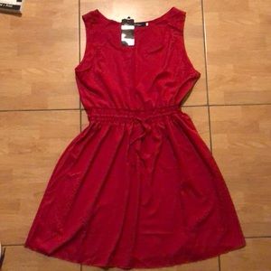 Tags on red dress